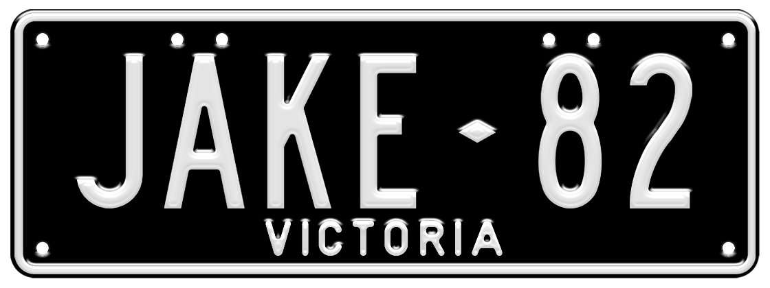 Custom plate - white embossed text on black background, two sets of characters separated by a diamond divider (for example JAKE- 82) 