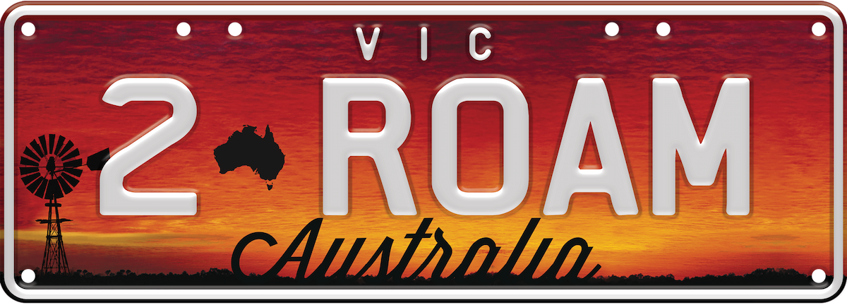 Aussie plate -  white embossed text on Australia sunset theme background, one set of characters (for example 2ROAM ), with VIC written at the top. Eight screws on the edges of the plate