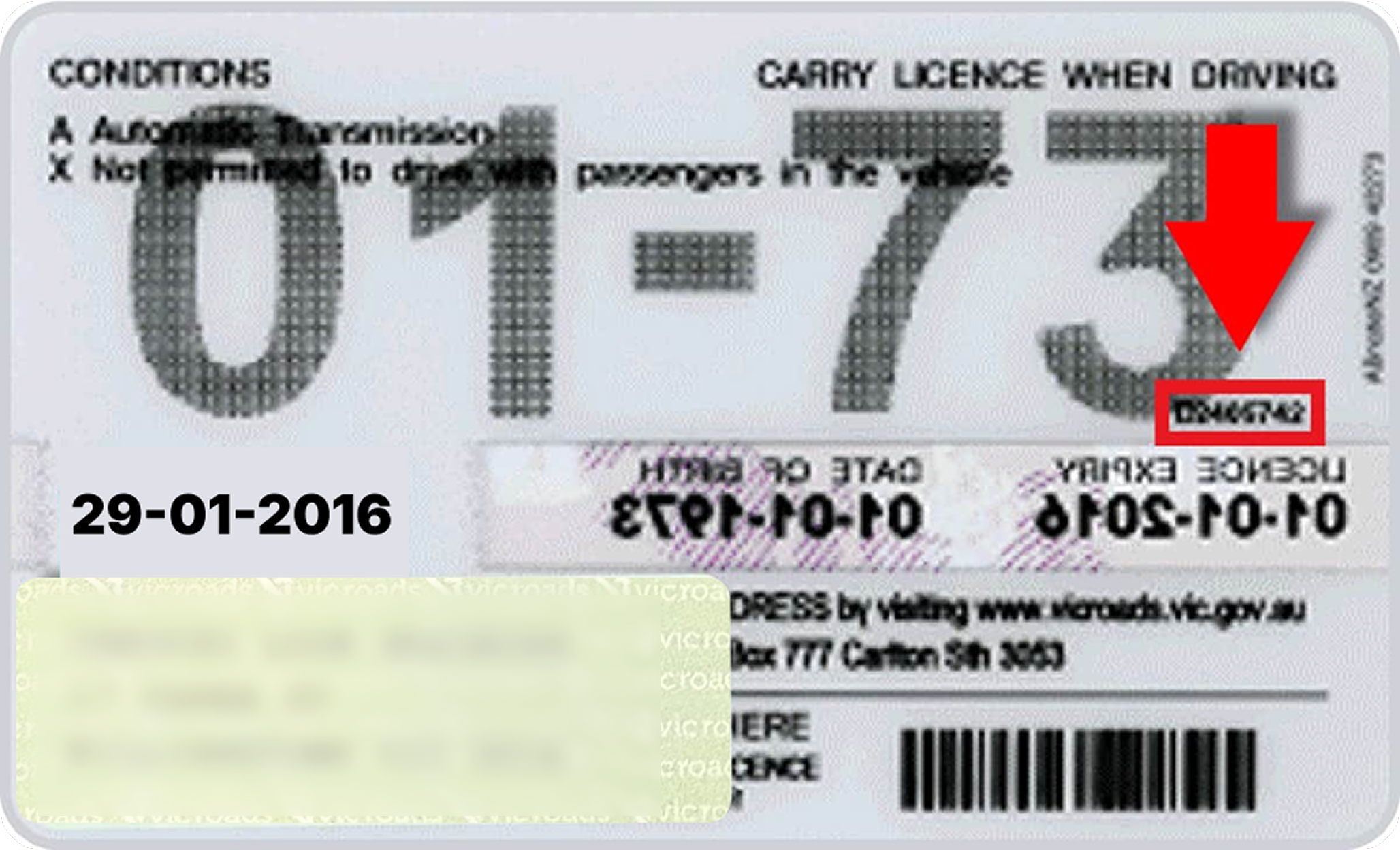 Card showing card number beneath the birth year on the back