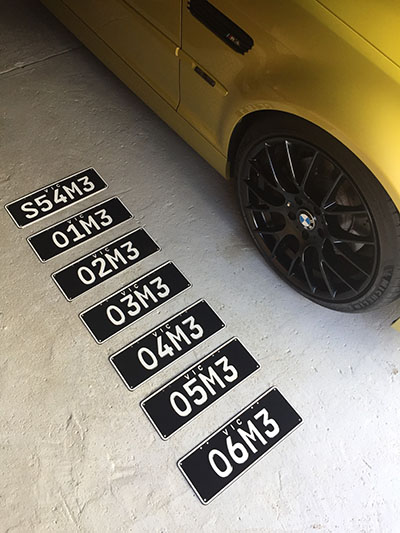 Yellow Car and Black Plates